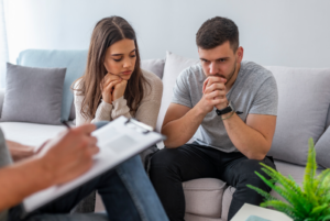 Couple discussing a recent argument calmly, focusing on growth and understanding